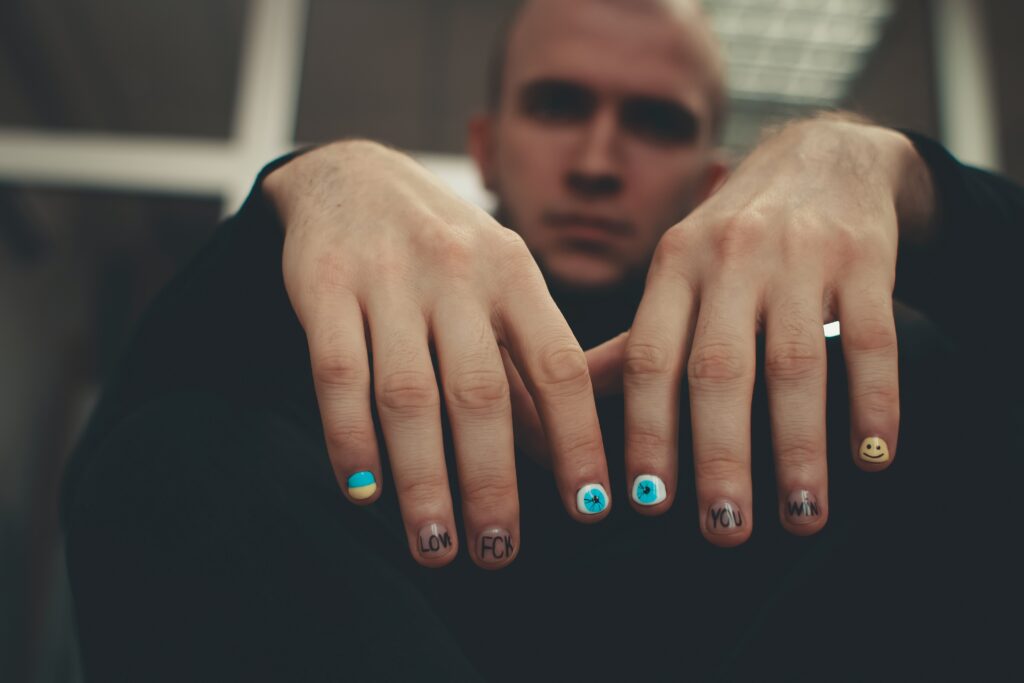 why-do-guys-paint-their-nails-black-johnny-holland